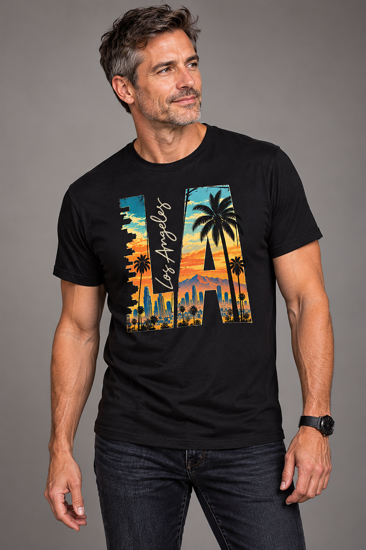 A man wearing a los angeles t-shirt, black graphic tee, la letterform skyline design, downtown los angeles sunset graphic, palm tree cityscape illustration, west coast streetwear shirt, city of angels print design, sunset skyline art, vintage travel style graphic, unisex crew neck shirt