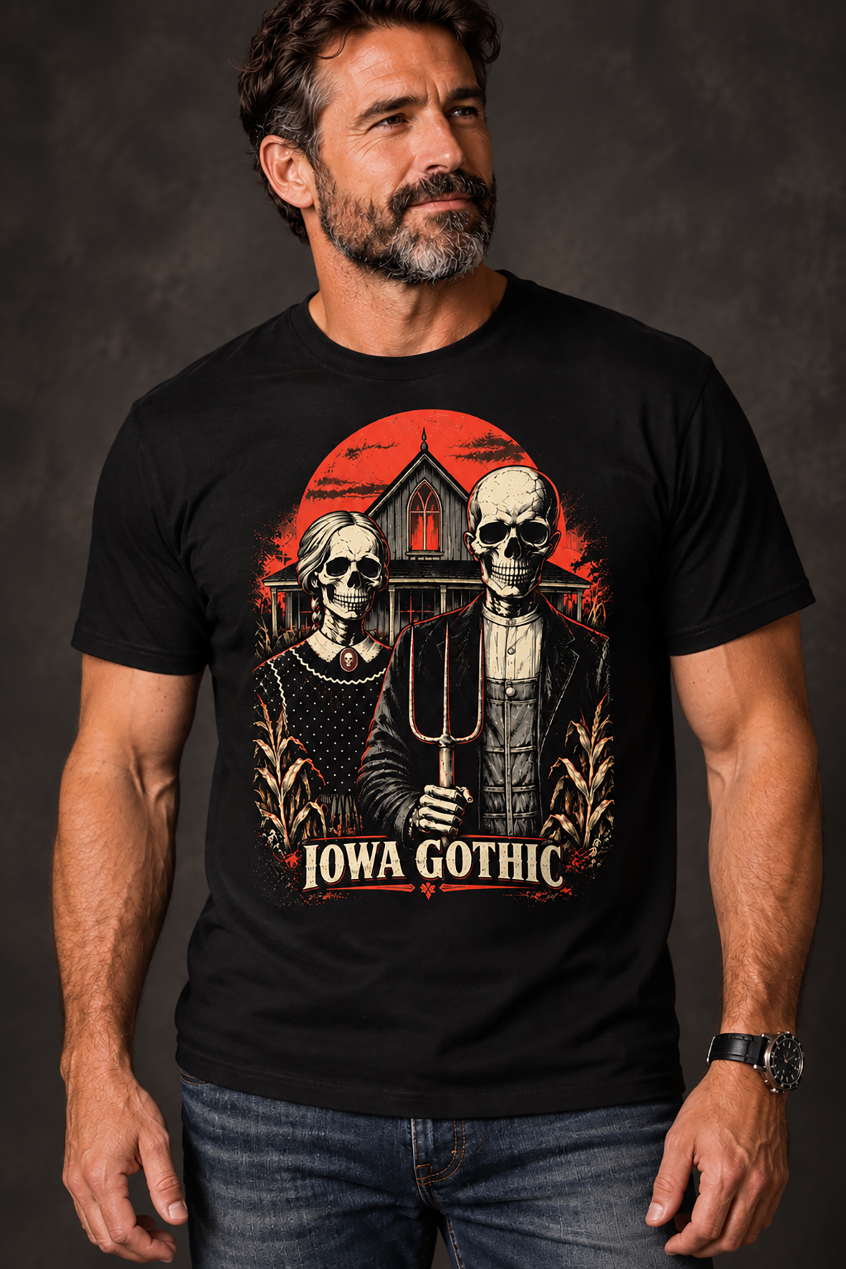 A man wearing an iowa gothic t-shirt, black graphic tee, skeleton farm couple illustration, gothic farmhouse graphic design, american gothic parody print, pitchfork skull art, blood red sky design, midwest horror streetwear shirt, cornfield gothic graphic, unisex crew neck shirt
