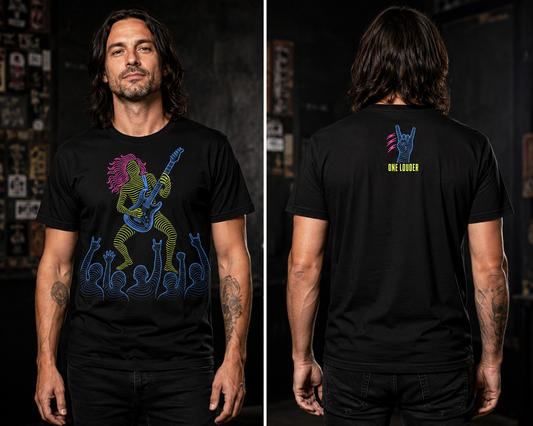 Man with long dark hair wearing a black graphic t-shirt, shown from the front and back — front has a neon-lined rock guitarist and cheering crowd design in yellow, blue, and magenta, back has a neon blue rock-and-roll hand sign with "One Louder" in yellow lettering.