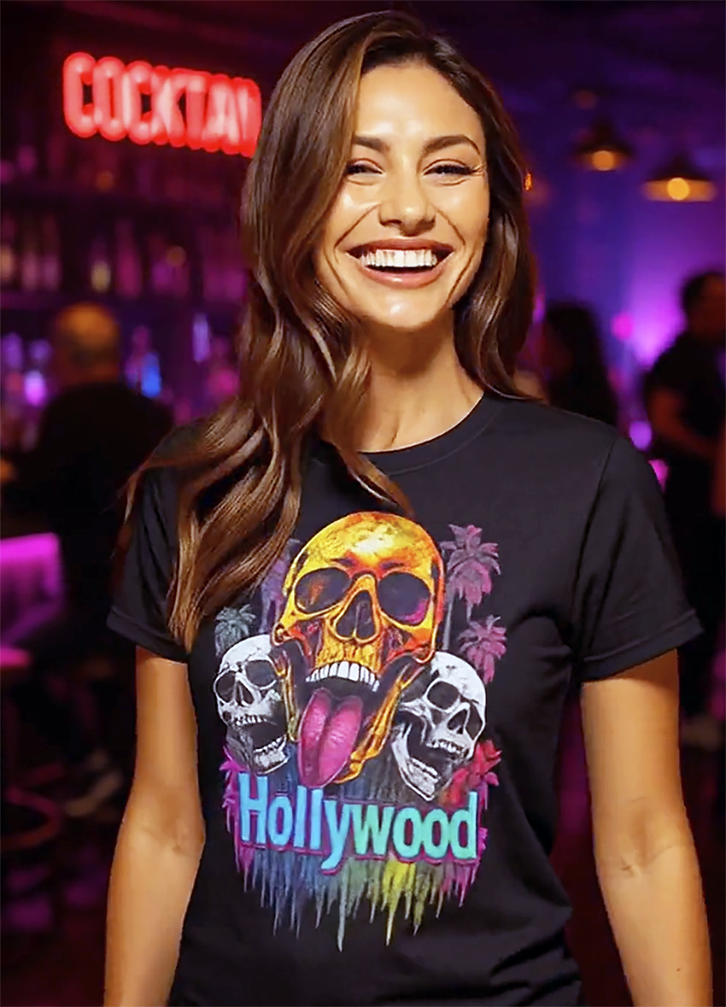 Hollywood is Dead skull palm tree graphic tee worn by glamorous female model at neon cocktail bar purple lighting black t-shirt