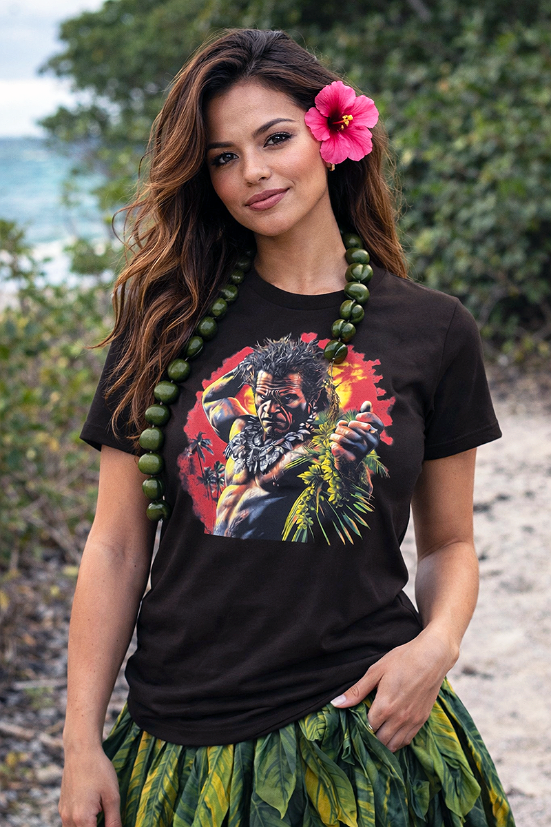 Island Wrath Polynesian warrior portrait graphic tee worn by Polynesian female model with hibiscus flower kukui nut lei ti leaf skirt on tropical beach dark chocolate t-shirt