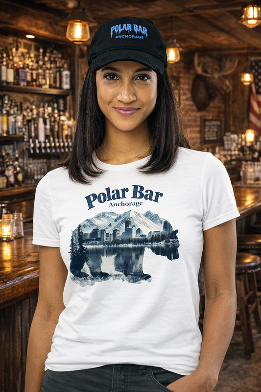 Polar Bar Anchorage distressed dad hat worn by female model inside bar with Polar Bar t-shirt warm Edison bulb lighting black hat