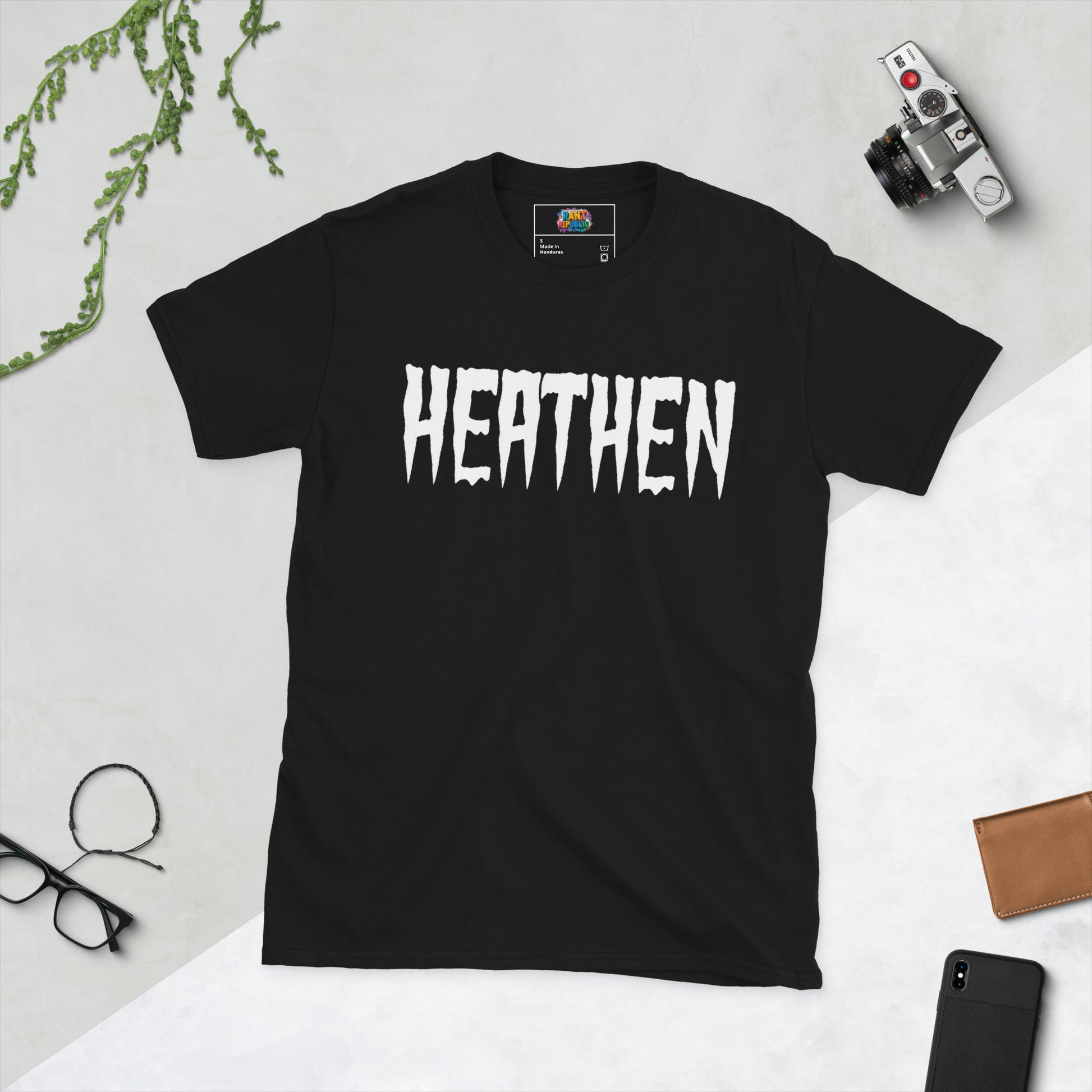 Heathen_shirt_black_graphic_tee_dripping_horror-style_white_lettering_design_black_t-shirt_product_photo_on_plain_background