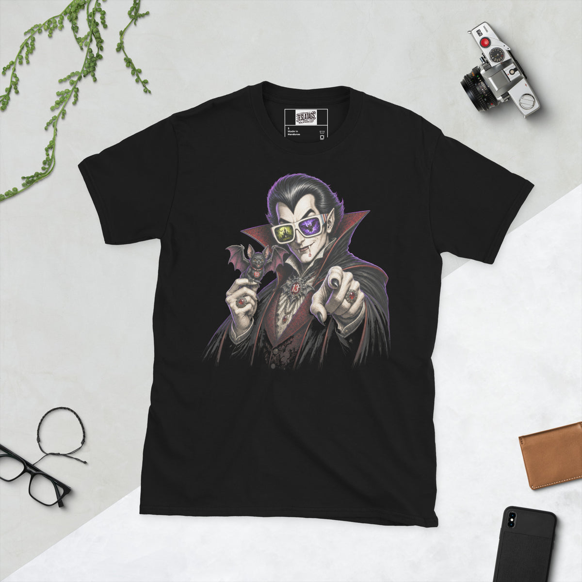 vampire t-shirt, black graphic tee, gothic count illustration, purple glowing hair, red lined cape, retro striped sunglasses, bat companion graphic, halloween horror tee, vintage vampire design, unisex crew neck shirt
