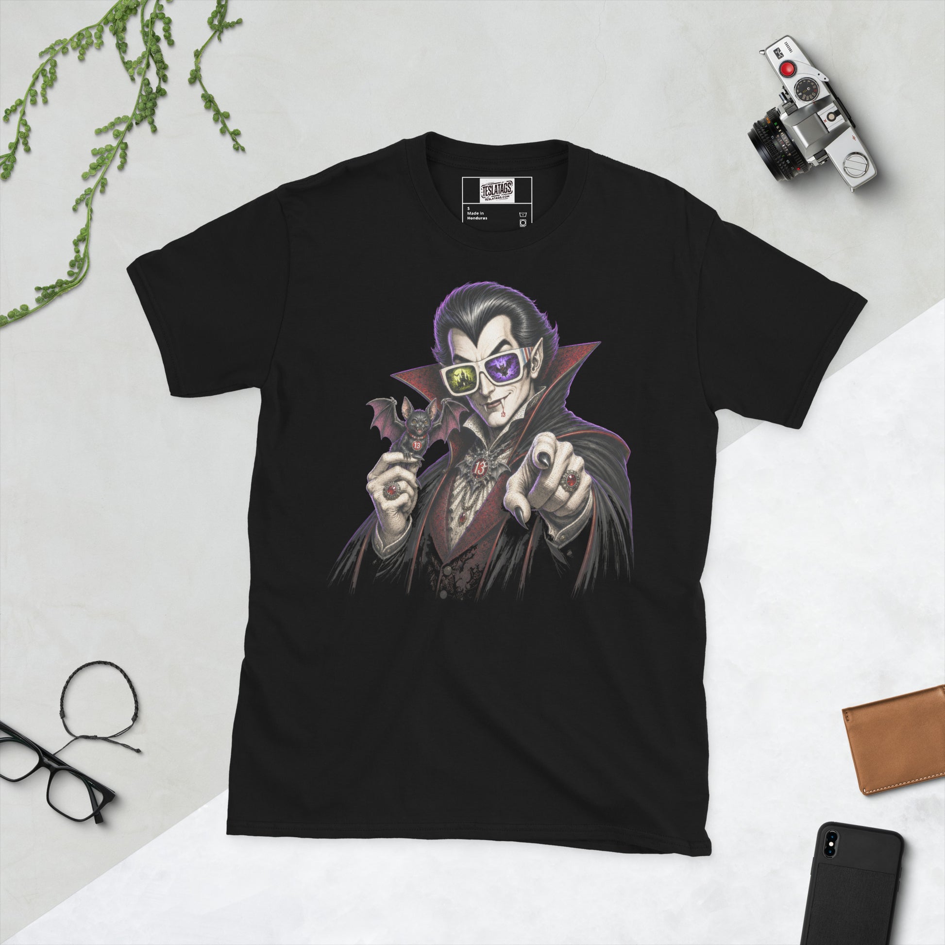 vampire t-shirt, black graphic tee, gothic count illustration, purple glowing hair, red lined cape, retro striped sunglasses, bat companion graphic, halloween horror tee, vintage vampire design, unisex crew neck shirt