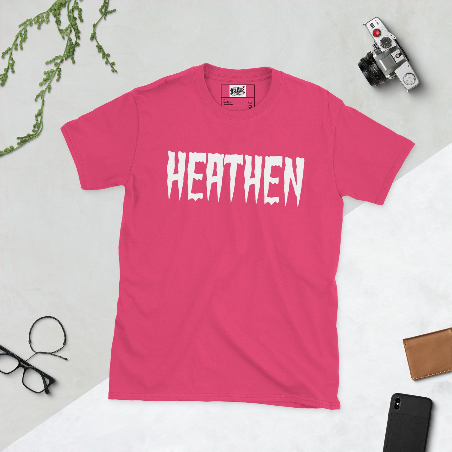 Heathen shirt heliconia pink graphic tee, dripping horror-style white lettering design, heliconia pink t-shirt product photo on plain background