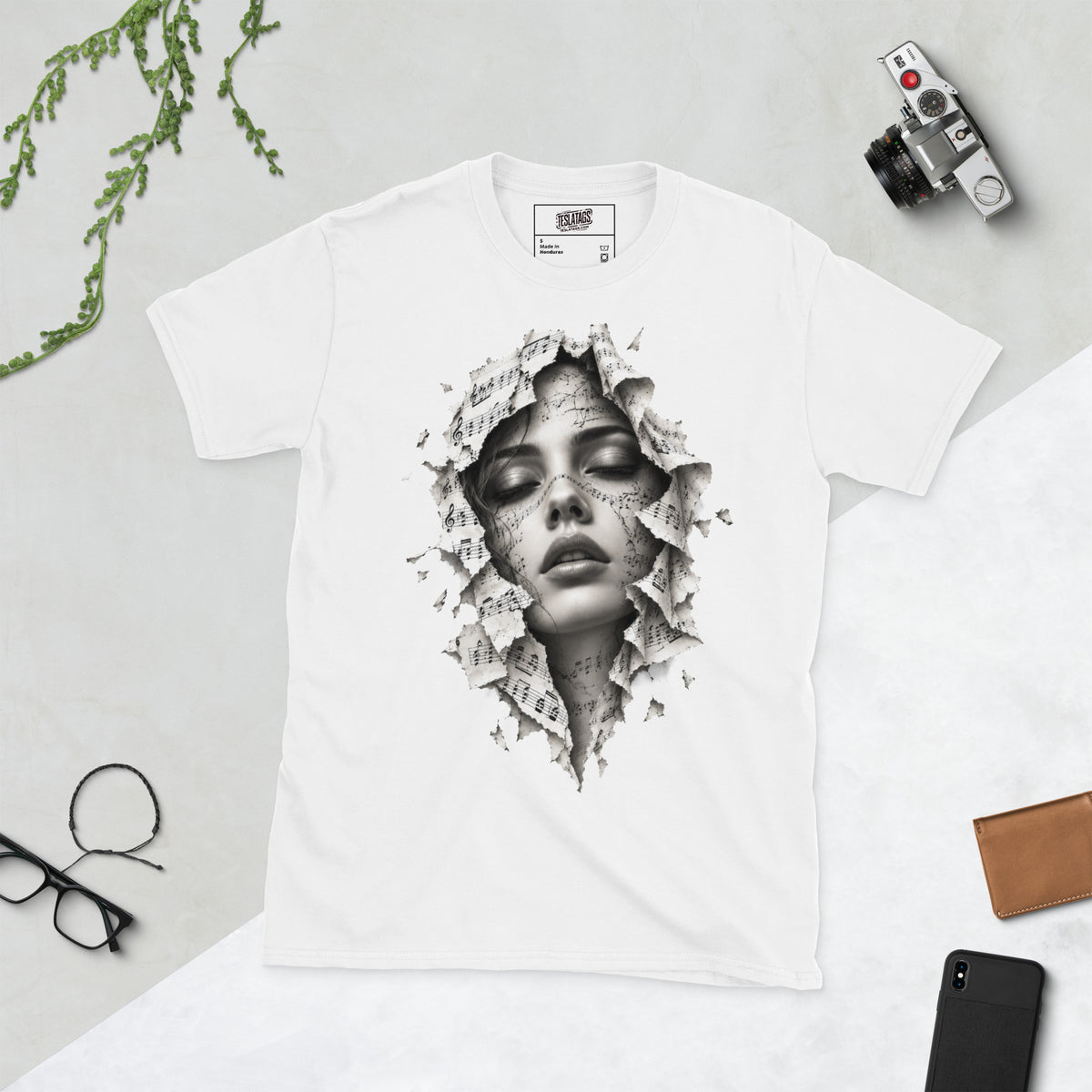 the music within t-shirt, white graphic tee, woman face sheet music illustration, torn paper portrait design, musical notes face art, black and white photorealistic print, music lover graphic shirt, staff lines face design, artistic monochrome portrait, unisex crew neck shirt